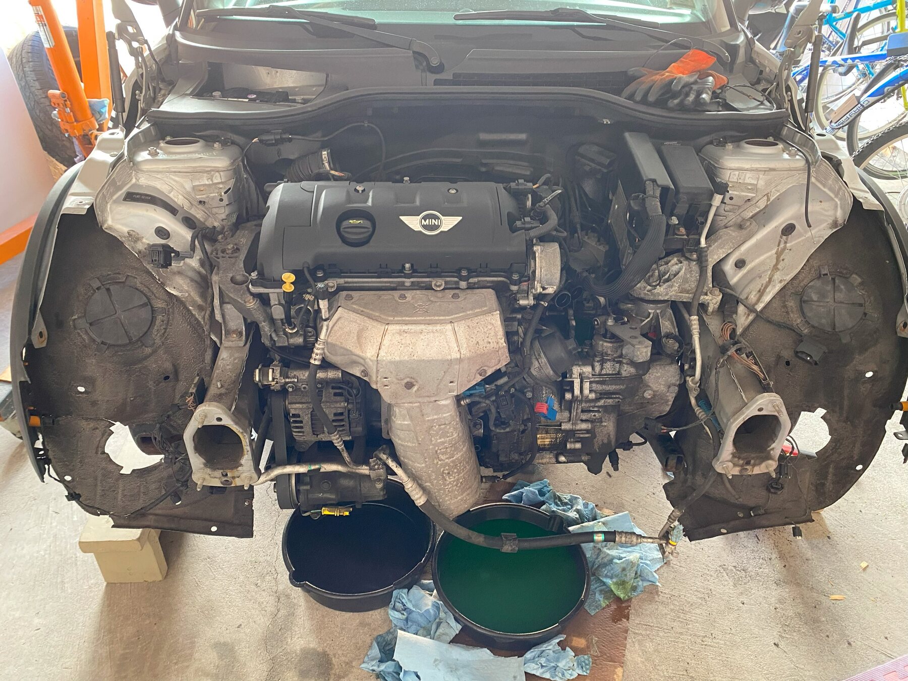 Front view of the Mini Cooper engine bay mid-swap